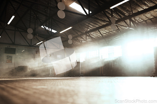 Image of Sunshine, fitness and empty gym for exercise, workout and training. Sunlight, room and a club for sports, health or cardio and exercising routine in the morning in summer for wellness and recreation