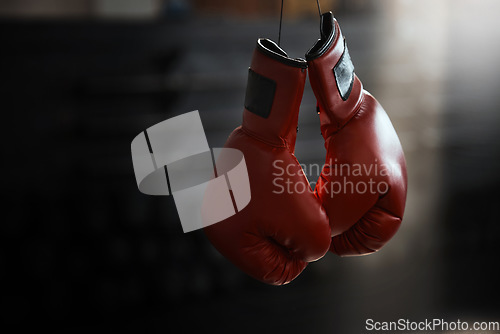 Image of Empty, gym and boxing gloves for fitness, sports and training, wellness and healthy lifestyle. Protective, glove and fighting sport equipment at a health center for workout, endurance and challenge