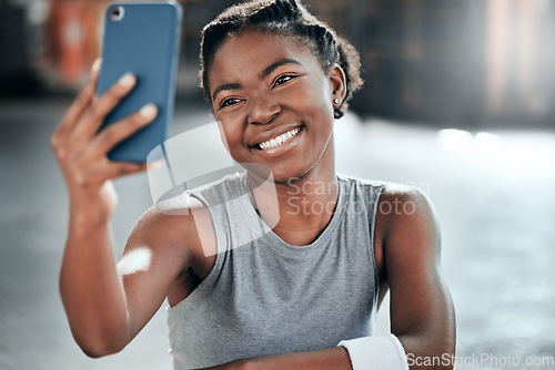 Image of African woman, gym selfie and smile for fitness, workout or wellness on floor with social media app. Influencer girl, photography or blog for exercise, performance and health for lifestyle in club