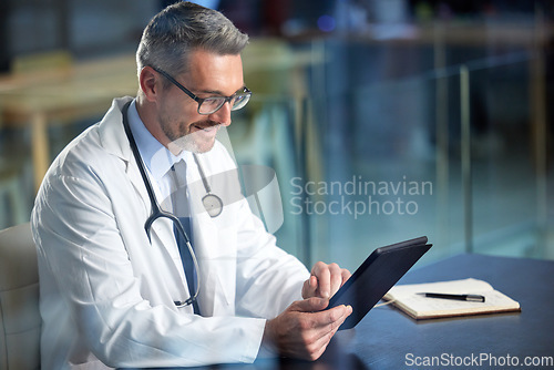 Image of Healthcare, doctor and man with a tablet, typing and connection with online reading, innovation and internet. Male person, employee and medical physician with technology, website info or professional