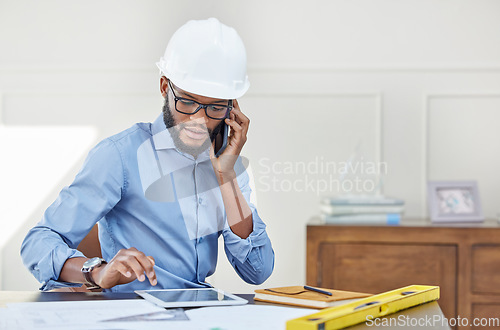 Image of Planning, man architect with smartphone and tablet at his desk in his workplace office. Architecture, industrial and male construction worker on a cellphone on a call at his workspace with ppe