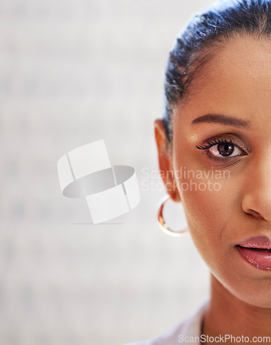 Image of Half, serious portrait and woman face isolated on blurred background, business marketing space and promotion. Serious, empowerment and professional or young african person, worker or employee zoom