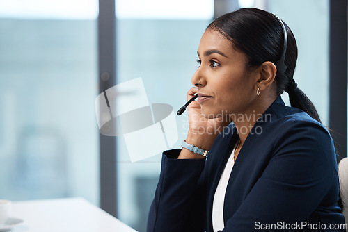 Image of Telemarketing, listening and business woman in call center office for customer service, help desk or technical support. Crm, contact us and female sales agent, consultant or employee working with mic