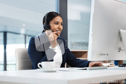 Image of Call center, woman and talking at computer in office for customer service, tech support and sales consulting. Happy female agent, telemarketing and communication at desktop for telecom, CRM or advice