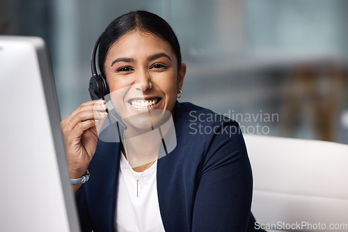 Image of Happy call center, portrait and a woman with a computer at a desk for telemarketing support. Smile, contact us and a customer care employee talking with a headset for advice and help and online sales