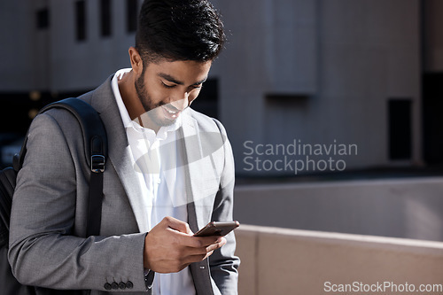 Image of Happy, city connection and a businessman with a phone for social media, chat or reading an email. Smile, typing and an employee on a mobile app for a gps or notification during a morning commute