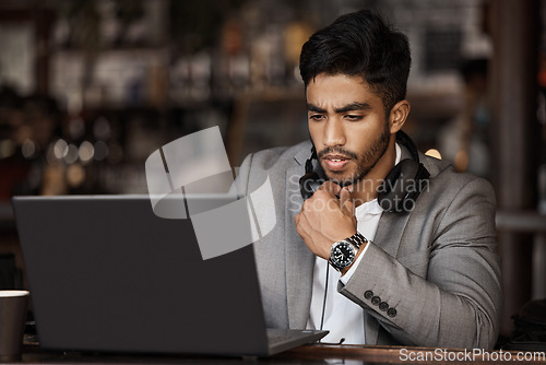 Image of Thinking, laptop or businessman with research in cafe reading news for online stock market update. Pensive, remote work or trader working on solution or trading in coffee shop on digital technology