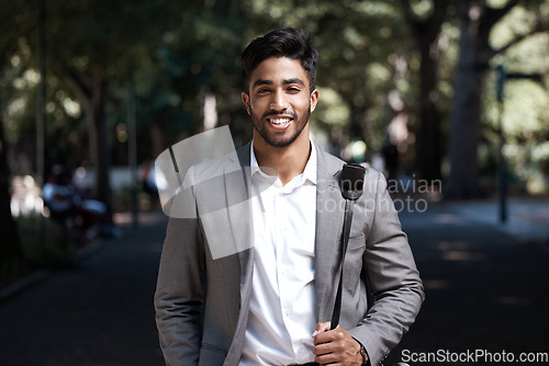 Image of Portrait, business man and smile in city for travel, morning commute and urban journey outdoor. Corporate male worker, happiness and confidence in street with pride, professional commitment and bag