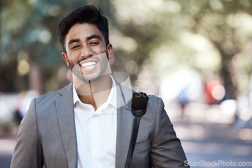 Image of Portrait, business man and laughing in city for travel, morning commute and urban journey outdoor. Happy corporate, male employee and smile with confidence, pride or professional commitment in street