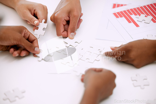 Image of Puzzle, hands and group of people in solution, teamwork and data goals, charts or graphs connection. Team building, mission and development of women and men problem solving, synergy or collaboration