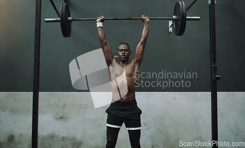 Image of Weightlifting, fitness and black man with barbell in gym for training, exercise and intense workout. Deadlift, strong body and male body builder lifting weights for challenge, wellness and strength