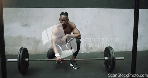 Image of Weightlifting, fitness and portrait of black man with barbell in gym for training, exercise and workout. Strong body, muscle and male bodybuilder lift weights for challenge, wellness and strength