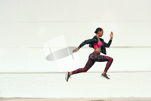 Image of Woman, fitness and running jump action on mockup for cardio training, exercise or workout outdoors. Fit, active and sporty female person or runner exercising for health and wellness on mock up space
