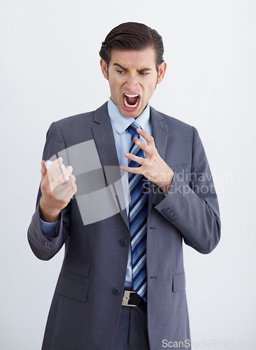 Image of Fail, phone call and business man angry, annoyed and screaming in studio on white background. Stress, anger and male person annoyed with phishing, delay and conversation with bad connection problem