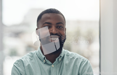 Image of Black business man, portrait and smile by window with happiness, pride and entrepreneurship at startup. African businessman, face and happy manager at company, success and confidence in finance job