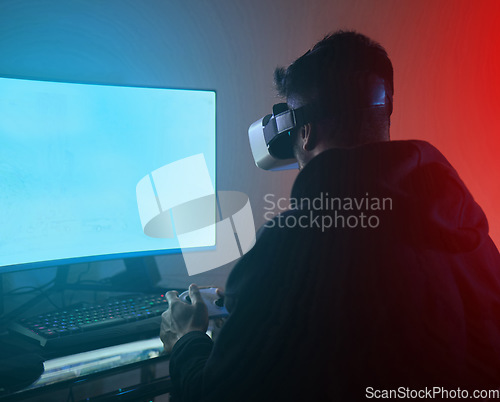 Image of Man, computer with green screen, virtual reality and gaming, online streaming metaverse and mockup space. Digital world, VR goggles and controller, future technology and male streamer in dark room