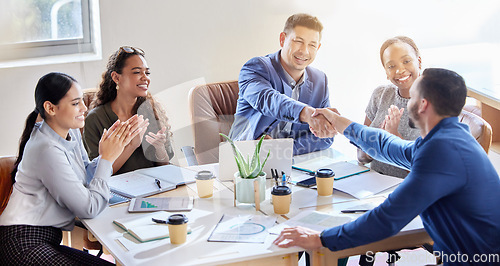 Image of Business people, handshake and applause in meeting for hiring, b2b agreement or teamwork at office. Happy group of employees shaking hands and clapping in recruitment, partnership or corporate growth