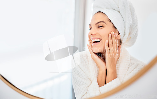 Image of Mirror, happy woman and hands on face for skincare, smile and anti aging cosmetic result in bathroom. Facial, beauty and female touch soft, glow or smooth skin from luxury dermatology routine at home