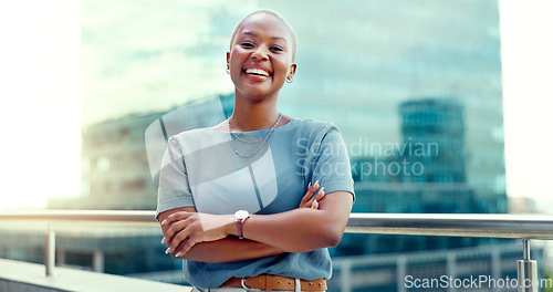 Image of Black woman in city for business portrait while happy and arms crossed outdoor with vision and pride. Face of entrepreneur person with urban buildings and motivation for career goals as future leader