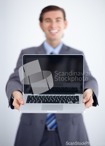 Image of Laptop screen, mockup and business man in studio for website, email and administration. Happy, smile and technology with male employee in white background for corporate, internet and networking