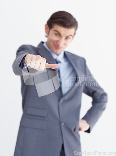 Image of Hand, vote and thumbs down by unhappy business man in studio with bad news or disappointed on white background. review, fail and male person with negative, feedback and finger emoji for rejection