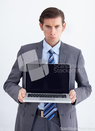 Image of Blank screen, laptop and portrait of a upset business man with 404 and internet problem. Isolated, white background and studio with a male businessman with computer issue and technology error