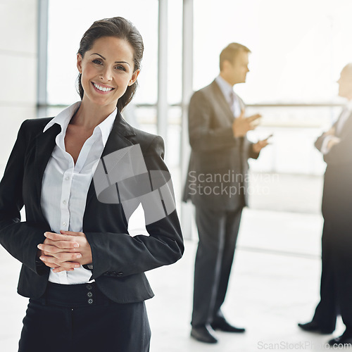 Image of Portrait, management and a leader woman in corporate business standing in her office as a professional. Leadership, company and professional with a happy female manager in her workplace for success