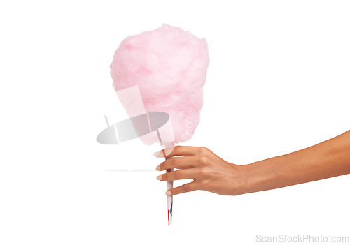 Image of Closeup, woman and hand with cotton candy, dessert and sweets isolated against a white studio background. Zoom, female person and model with a carnival snack, tasty and fingers with sugar clouds