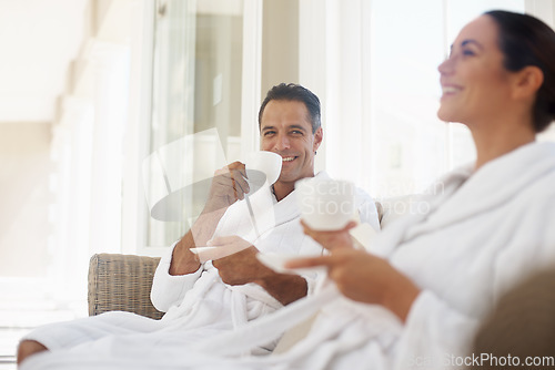 Image of Laugh, coffee and smile with couple at spa for luxury, vacation and romance. Breakfast, peace and morning with happy man and woman at hotel resort for wellness, celebration and holiday travel