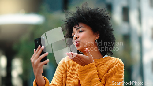 Image of Video call, phone and black woman in city talking online, travel update and 5g communication or funny chat. Laughing gen z person or student on cellphone, mobile and live streaming for urban outdoor