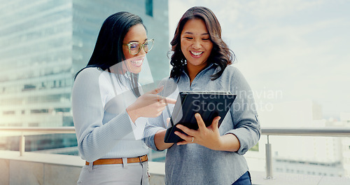 Image of Tablet, partnership teamwork and happy people on balcony review social network, customer experience or business ecommerce. Brand monitoring data, talking and women teamwork on online survey feedback