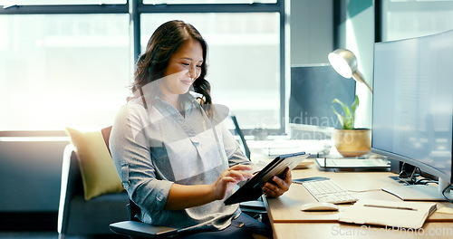 Image of Digital tablet, office and business woman doing research for a corporate project by her desk. Technology, internet and professional female employee working on company report or proposal at workplace.