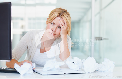 Image of Stress, thinking and frustrated woman with crumpled papers on her desk in business office. Burnout, idea and female professional with lack of creativity, depression and fatigue, tired and brain fog.