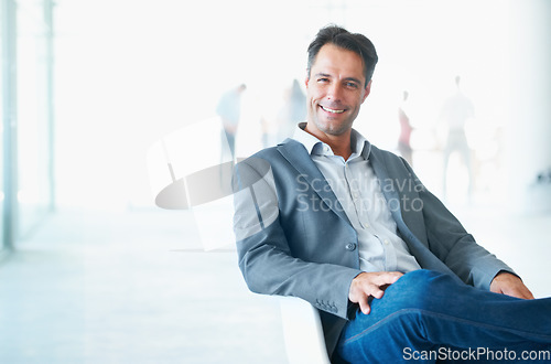 Image of Portrait, smile and business man on chair in office with pride for career or job on mockup. Professional, male entrepreneur and happy executive, mature ceo or person from Canada sitting in workplace.