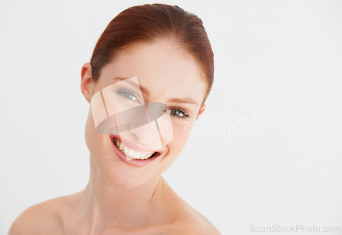 Image of Skincare, beauty and portrait of woman in studio for cosmetics, wellness and facial on white background. Dermatology, spa and happy face of female person with natural makeup, smooth and health skin