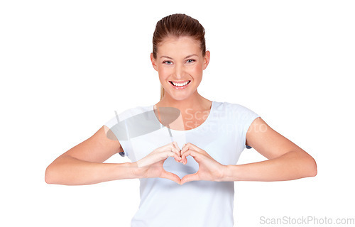 Image of Love, smile and portrait of happy woman doing heart sign, shape or gesture with hands isolated in a white studio background. Support, casual and female person with happiness, care and kindness signal