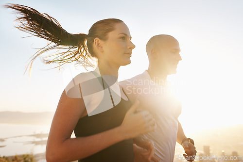 Image of Sunrise, wellness and running couple doing workout or morning exercise for health and fitness together. Sport, marathon and woman runner run with man athlete training in cardio for sports or energy