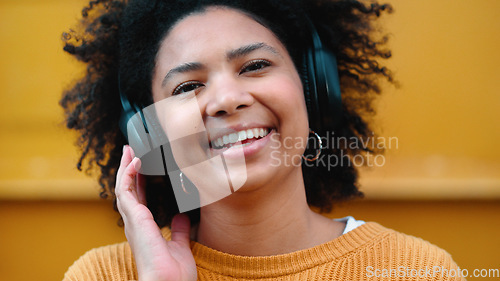 Image of Black woman, portrait or music headphones on isolated yellow background, fashion mockup or wall mock up. Smile, happy or laughing student listening to radio, audio and podcast in trendy or cool cloth