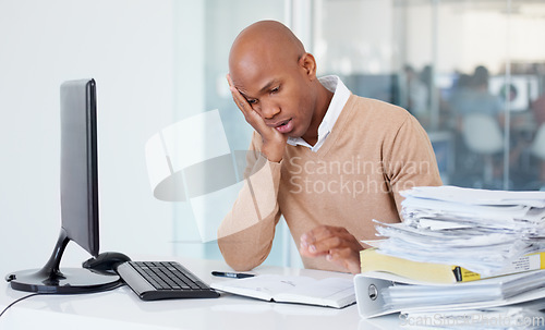 Image of Business stress, pile of paperwork and black man overworked, exhausted and tired in office. Burnout, stack of documents and male worker with depression, fatigue and overwhelmed in workplace.