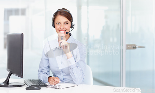 Image of Business woman, call center and smile in customer service, support or telemarketing at office. Portrait of happy female consultant agent smiling for online advice, advisory or help desk at workplace