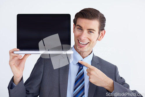 Image of Mockup, laptop and business man portrait pointing to screen space against a white background. Hands, display and face of male person with computer copy space for advertising, marketing or branding