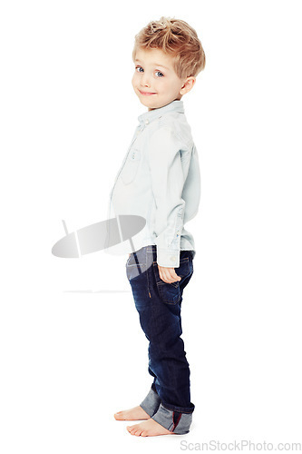 Image of Cute, smile and portrait of a child with fashion isolated on a white background in a studio. Adorable, happy and a little boy as a clothes model in jeans for youth with happiness and smiling