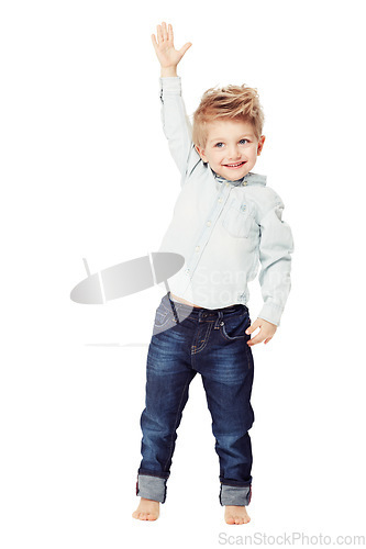 Image of Children, raised hand and a cute little boy in studio isolated on a white background with a carefree smile. Wow, winner and kids with a young adorable male child raising his arm to ask a question