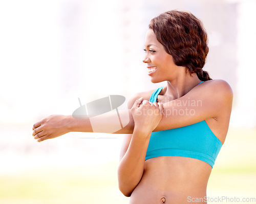 Image of Health, fitness and happy woman stretching arms outdoor for running, training or workout on blurred background. Smile, warm up and arm stretch by African lady runner in park for cardio run with space