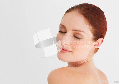 Image of Beauty, eyes closed and face of happy woman in white background, isolated studio mockup and natural skincare. Female model, aesthetic glow and cosmetics for facial dermatology, self love and smile