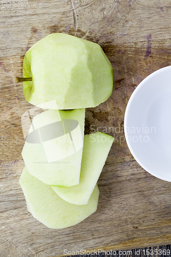 Image of cut peeled green Apple