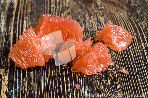 Image of a piece of peeled grapefruit