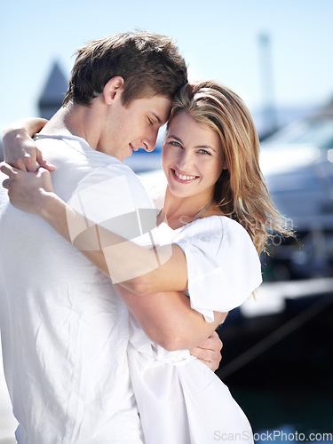 Image of Harbor, love and portrait of couple hug with smile on summer holiday, vacation and adventure by sea. Travel, romance and man and woman excited for luxury cruise for journey, romantic trip and bonding