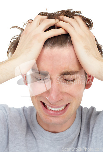 Image of Man, frustrated crying and loss in studio for mental health problem, depression or pain by white background. Male model, sad student or anxiety with tears, depressed or cry for stress, grief or anger