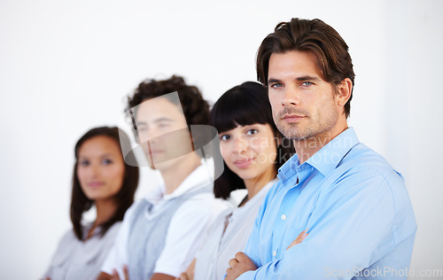 Image of Business people, portrait and arms crossed for professional leadership, management or teamwork at office. Confident employee executives standing for team building or company goals at workplace